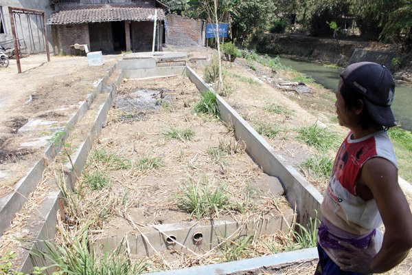 Bangunan IPAL tahu seluas 260 persegi mangkrak di Kecamatan Sragen Kota, Kabupaten Sragen, Jateng, 26 Agustus 2018. (Foto: Bisnis/Tri Rahayu)