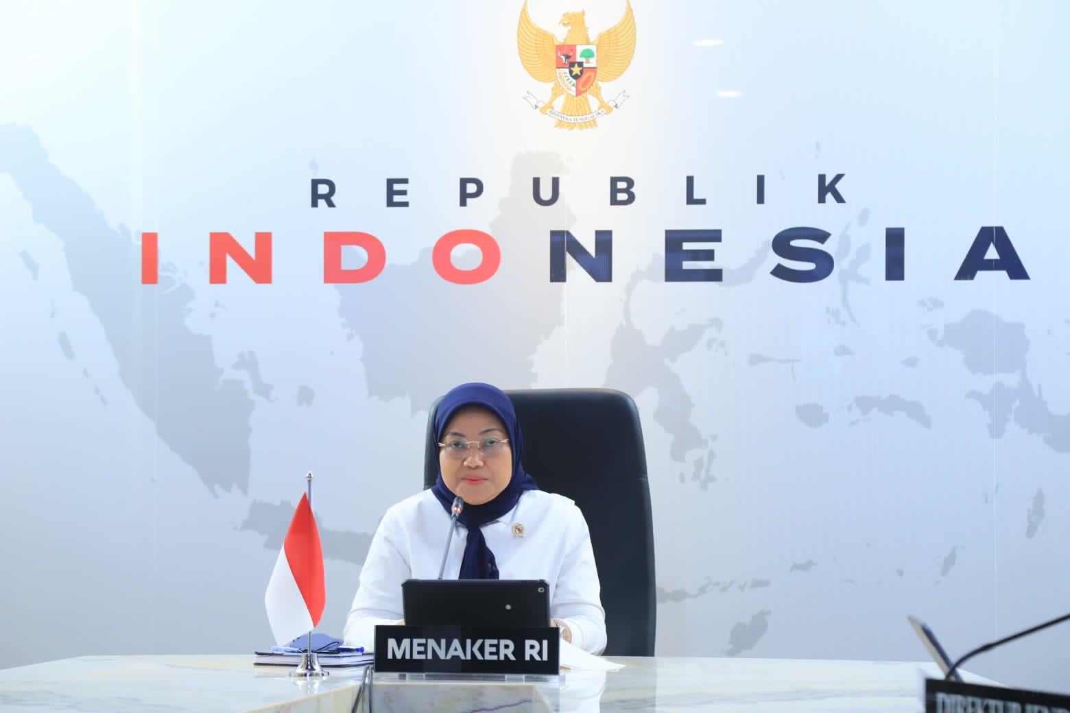 Menaker, Ida Fauziah saat konferensi pers vrtual. Foto: kemnaker.go.id